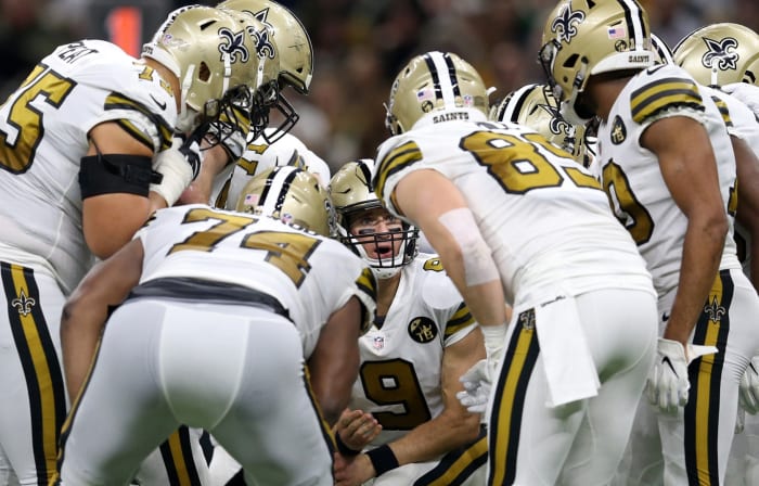 New Orleans, LA, USA; New Orleans Saints quarterback Drew Brees (9) calls a play in the huddle in the second quarter against the Philadelphia Eagles at the Mercedes-Benz Superdome. Mandatory Credit: Chuck Cook-USA TODAY